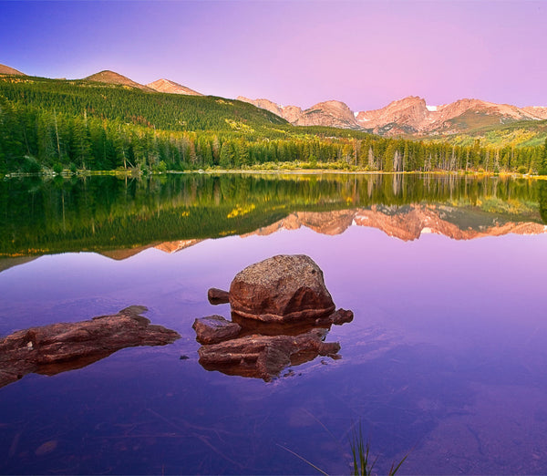 lake with forest and mountains